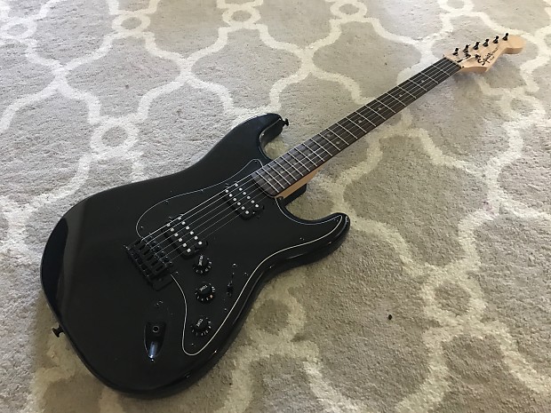 Dual outlet humbucker strat