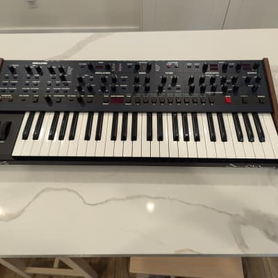 Sequential OB-6 49-Key 6-Voice Polyphonic Synthesizer Black with Wood Sides and Decksaver cover