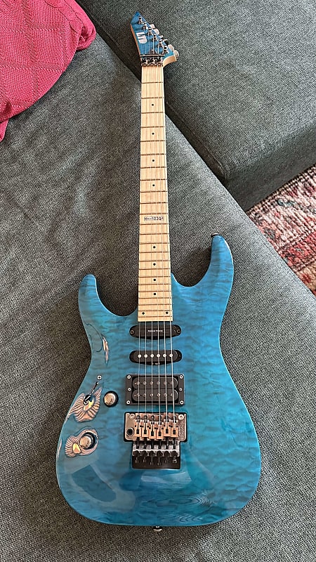 ESP LTD MH-103QM - See-Thru Blue (LEFT-HANDED) | Reverb