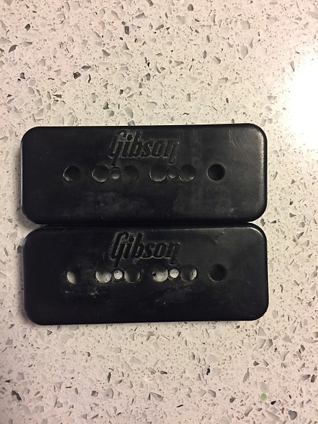Pair of Gibson P90 pickup covers with embossed logos 1971-72 image 1