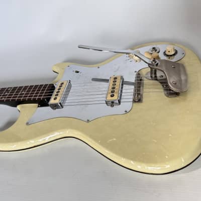 Isana solidbody guitar 1960s - pearloid vinyl image 19