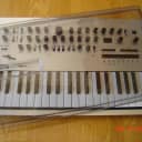 Korg Minilogue  Synthesizer with Decksaver Cover !