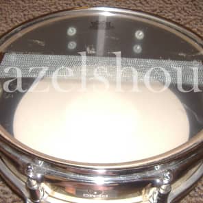REMOパーカッション Amazon.com: REMO Conga Drumhead, Symmetry, 11.06