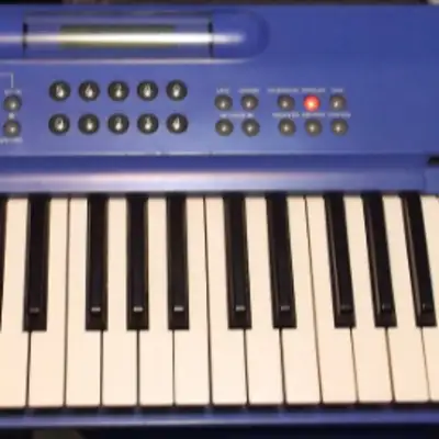 Rare blue Korg 707 FM Synthesizer
