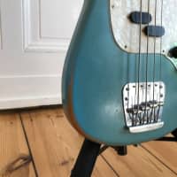 Julius' Collection of bass guitars that need new owners