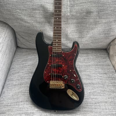 Fender USA American Deluxe Stratocaster SCN Montego Black
