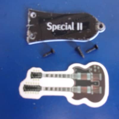 Epiphone Lot of Les Paul Special II Truss Cover with protective plastic cover and 3 x screws plus a double neck guitar decal image 2