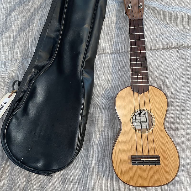 Mele Kalia Concert Ukulele Solid Cedar | Reverb