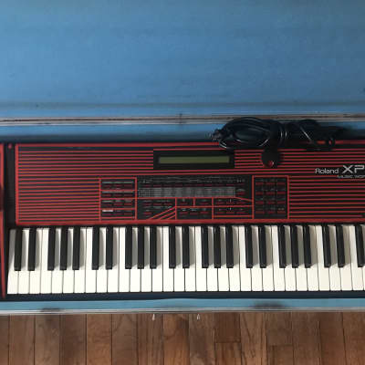 Roland XP-50 61-Key 64-Voice Music Workstation with 4 expansion cards, flight case and complete cap replacement.