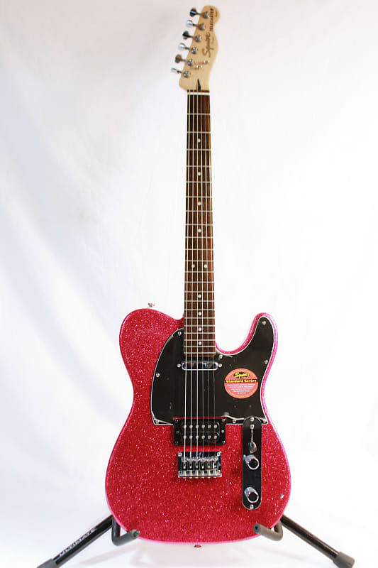 2009 Squier FSR Standard Telecaster HS in Cherry Red Sparkle 2009 Squier FSR Standard Telecaster HS in Cherry Red Sparkle