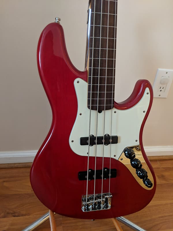 Fender Deluxe Fretless Jazz Bass 1998 Crimson Transparent | Reverb 