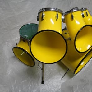 North drum set in yellow with 6'',8''10'' toms a 14'' floor tom and a 22'' bass drum with rack image 2