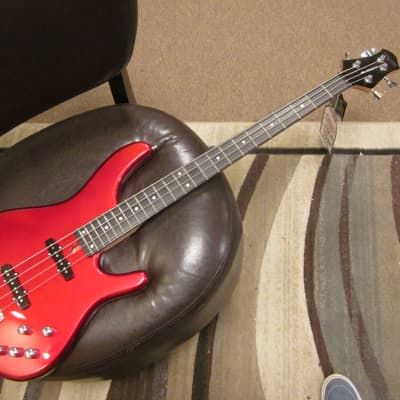 Tagima Millenium  4 electric bass 2020 in solid colors - red or black image 1