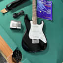 Squier Stratocaster Mini. With book, tuner,strap and cable.