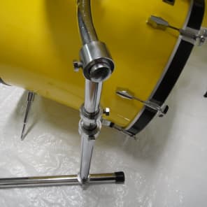 North drum set in yellow with 6'',8''10'' toms a 14'' floor tom and a 22'' bass drum with rack image 6
