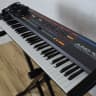 Roland vintage Juno-106 keyboard synthesizer near MINT-used synth for sale