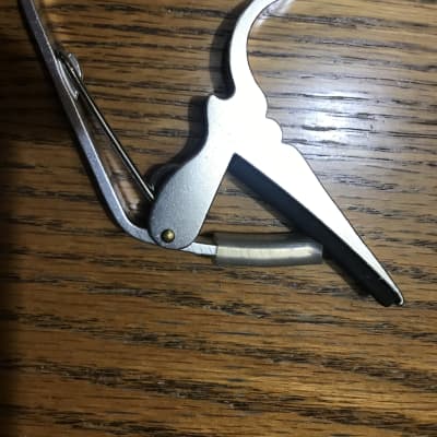Silver metal 6 string capo for sale