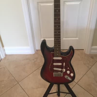 Fender Squier  by Fender Stratocaster Standard Series Rare  Black and Red image 1