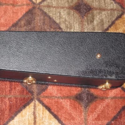 lightly used genuine Gibson Dreadnought Hardshell Case from 2017 - Black Tolex Exterior, Wood Construction, Black Plush Padded Interior, Gold Colored Hardware, lid has Gibson Acoustic Logo, fits square or round shoulder dreadnought (NO guitar included) image 16