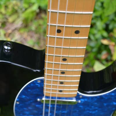 A very sharp Fender Standard Telecaster in Black w/New Blue pickguard, New Dunlop Straploks, New HSC, plus New Set up. image 8