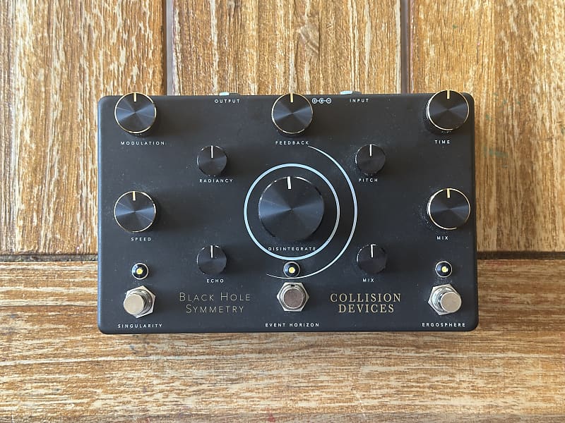 Collision Devices Black Hole Symmetry