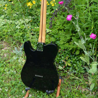 A very sharp Fender Standard Telecaster in Black w/New Blue pickguard, New Dunlop Straploks, New HSC, plus New Set up. image 5