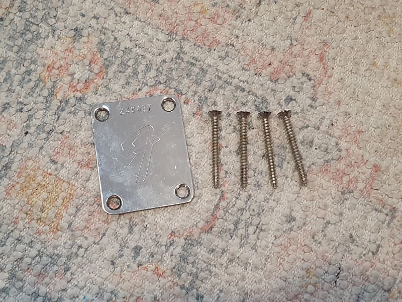 Vintage Fender Neckplate + Screws 1968 | Reverb