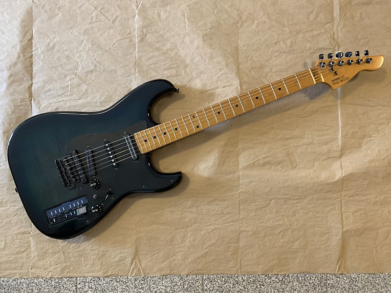 Casio PG-300 Turquioseburst Flame electric guitar with Midi
