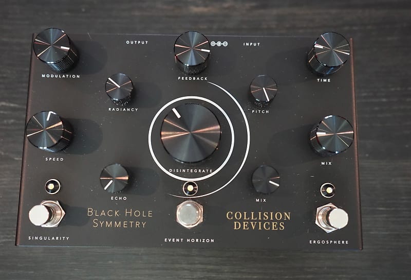 Collision Devices Black Hole Symmetry