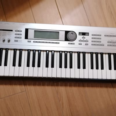 Korg Triton LE 61-Key with sampler card and full memory extended