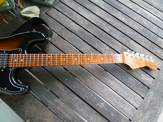 Roasted flame maple top strat neck