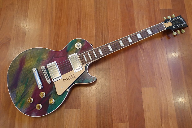 Gibson 2005 Les Paul Music Rising Mardi Gras resembles Edge s own guitar 2005 Hand Painted