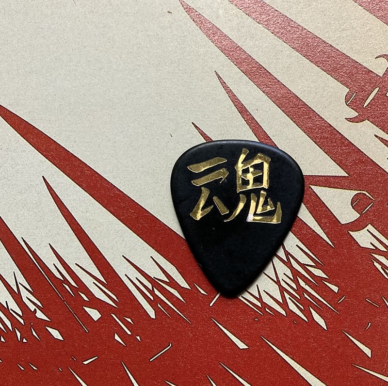 MOTLEY CRUE Nikki Sixx gold-on-black Japan tour guitar pick