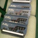 6 Aviom A-16II Personal Mixers,  One 16-Channel Analog Output Module, and  one A-Net Distributor