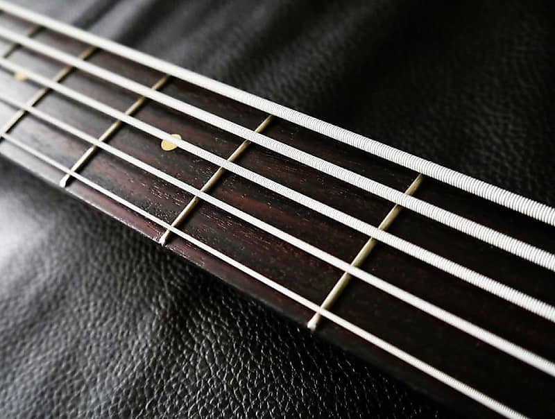 DR NWB6-30 Neon White Bass Guitar Strings; 6-String Set gauges 30-125