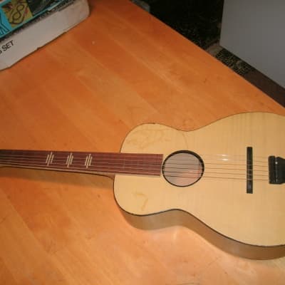 1946 WWII Stella H929 yellow parlor guitar with wooden tailpiece for sale