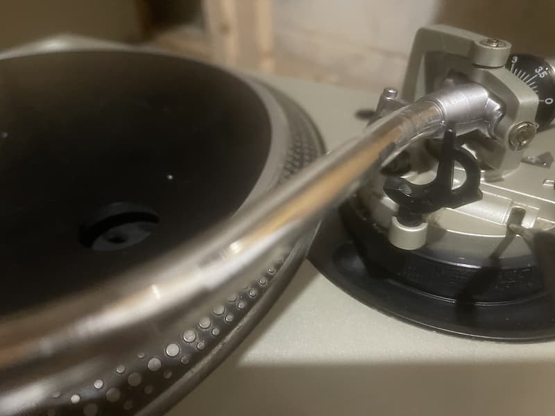 Technics 1200MK5 2000 Silver outfitted with a SHURE M44.7 cartridge housed  in a Black Road Ready Hard Case M