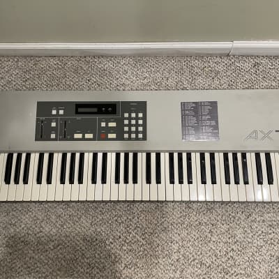 Akai AX 73 1980s - Gray - analog synthesizer, 73 key, MIDI