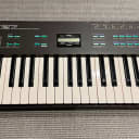 Yamaha DX27 61-Key Digital Programmable Algorithm Synthesizer in Flight Case