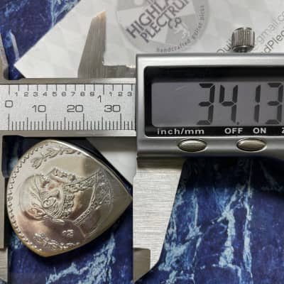 The Highland Plectrum Co. One (Large) Mexican 1966 Silver Peso Coin Pick/Plectrum. image 3