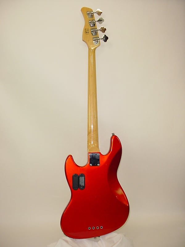 Sire Marcus Miller V7 Bass Guitar (1st Gen) Bright Metallic Red (Orange) -  Previously Owned