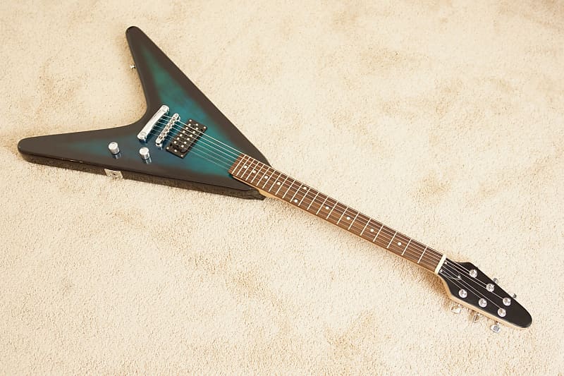 Flying V Guitar (unbranded) includes cord and strap image 1
