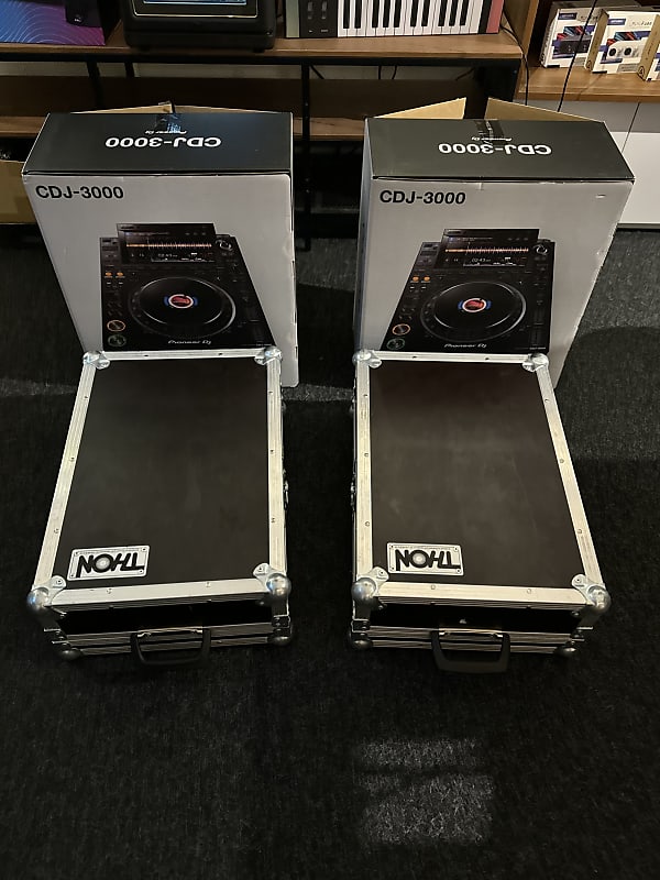 Pair of Pioneer DJ CDJ-3000 with flightcases image 1
