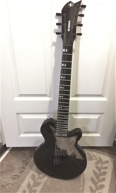 Yamaha 7 top string guitar