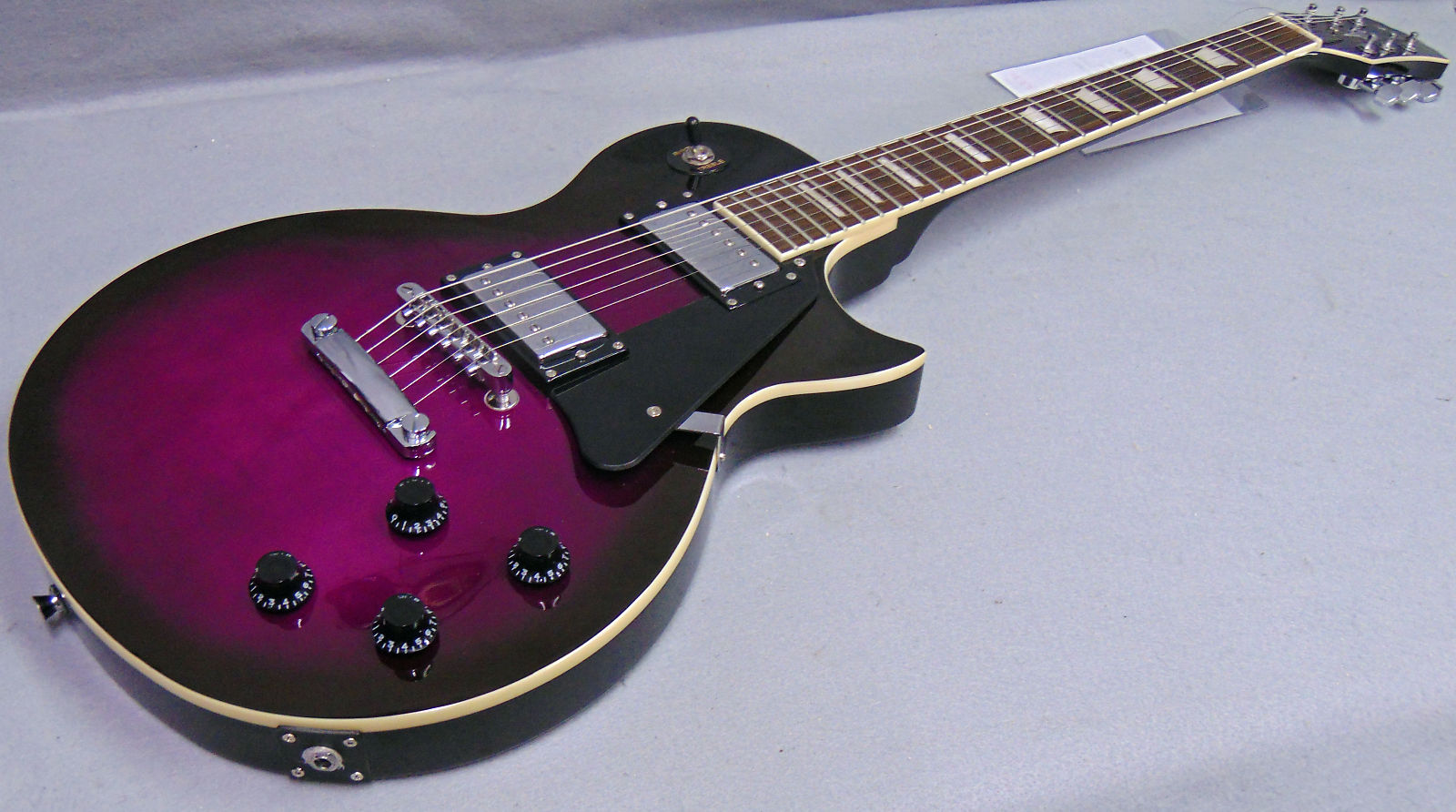 Oscar Schmidt OE20 FTPB Single Cutaway Flame Transparent Purpleburst Reverb Canada