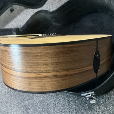Taylor 150e walnut 12 String acoustic electric guitar made in Mexico 2017-2018 with ES2 electronics in excellent condition with original taylor deluxe hard case and case candy . image 13