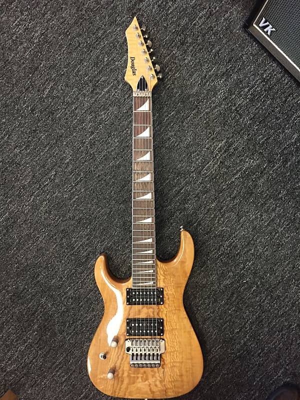 Douglas 7 string lefty natural Reverb
