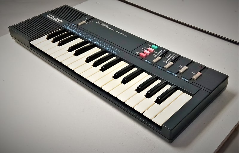 Casio Vintage Casio PT-100 32-Key Electronic Musical Instrument Keyboard  With Adapter
