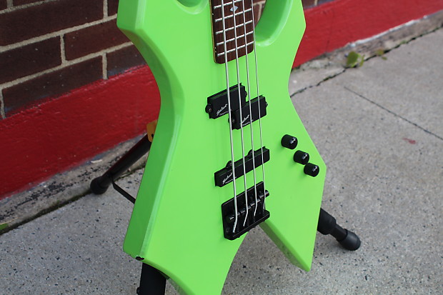 Lime green outlet bass guitar