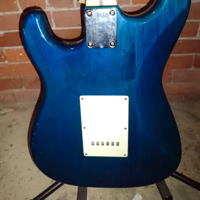 New York Pro Stratocaster Copy Trans Blue Lawsuit Headstock image 7